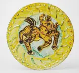 Centaure (Centaur) by Pablo Picasso, 1956, White earthenware round dish painted in yellow, red, green and black with partial brushed glaze,, sold Apr 2013