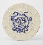Visage de Faune tourmenté (Tormented Faun’s Face) by Pablo Picasso, 1956, White earthenware round dish painted in blue and ivory with decoration and brushed glaze,, sold Apr 2013