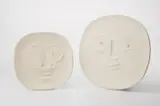 Visage aux Yeux Ronds (Round-Eyed Face); and Visage aux Grands Yeux (Big-Eyed Face) by Pablo Picasso, 1960, Two white earthenware plates,, sold Apr 2013