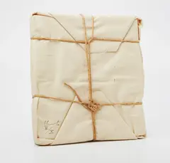 Wrapped Book by Christo, 1973, Book wrapped in canvas and twine,, sold Apr 2013