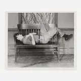 Weegee, Untitled (Man Sleeping on Window Bench)
