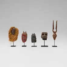 African, Passport masks, set of five, carved wood, fabric, fibers, metal