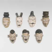 Ogoni, Elu (Spirit) masks, set of seven, carved and painted wood, metal, fiber