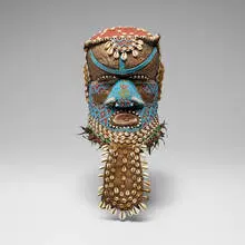Bushongo, Bwoom helmet mask, carved wood, hammered copper, burlap, Cowrie shells, beads