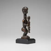 Bena Lulua, Figure with child, carved wood
