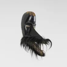 Dan, Gegon articulated mask, carved wood, hair