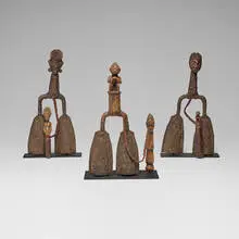Bamileke, Currency gongs, set of three, metal, wicker, carved wood, rope