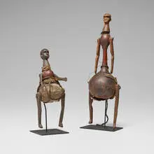 Divination gourds, set of two by Sukuma or Nyamwezi, gourd, rope, leather, metal, sold Dec 2025