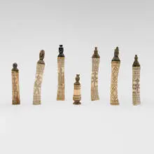 Indonesian, Collection of seven lime powder containers, carved bone, carved wood