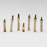 Indonesian, Collection of seven lime powder containers, carved bone, carved wood