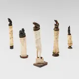 Indonesian, Collection of five lime powder containers, carved bone, carved wood