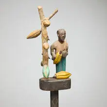 West African, Folk staff with figure and cocoa tree, carved and painted wood