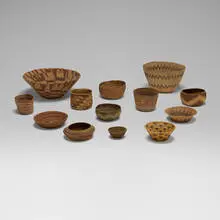 Native American, Collection of thirteen baskets, woven grass