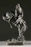 The Outlaw by Frederic Remington, Bronze - Height: 23 in, offered May 2004