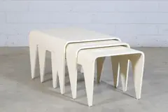 Nest of painted birch plywood tables by Marcel Breuer, 1936, sold Jan 2025