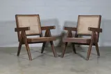 Pair of 'Easy' armchairs by Pierre Jeanneret, c.1955, each in teak and cane, sold Jan 2025