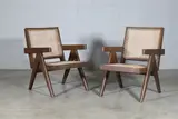 Pair of 'Easy' armchairs by Pierre Jeanneret, c.1955, teak and cane, sold Jan 2025
