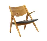 Oak 'Sawback' or 'CH28' chair by Hans J. Wegner, 1951, sold Jan 2025