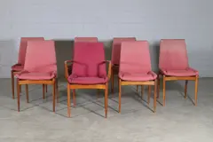 Robert Heritage, Set of seven teak 'Hamilton' chairs, c.1960, each with pale pink upholstery over tapering supports