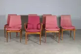 Robert Heritage, Set of seven teak 'Hamilton' chairs, c.1960, each with pale pink upholstery over tapering supports