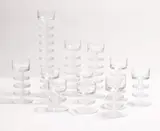 Ronald Stennett-Willson, Set of twelve 'Sheringham' glass candlesticks, c.1970, in clear glass