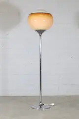 Harvey Guzzini, Untitled, c.1970, the cognac acrylic shade raised on a chrome column