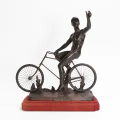 Jean Garnier, 'Le Champion', a bronze cyclist with a hand raised in victory