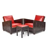 Art Déco, Pair of Club Chairs and an Ottoman, carved and stained oak, leather, brass studs