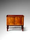 Otto Prutscher, Two-Door Cabinet, for Anton Popischil, solid, carved, and inlaid walnut, brass pulls, metal manufacturer's label to the inside door