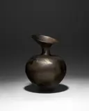 Dame Magdalene Odundo, Untitled, black burnished terracotta, incised 'Odundo 1986'