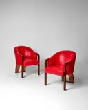 Éric Bagge, Pair of Armchairs, solid and veneered walnut, leather upholstery