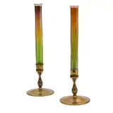 Pair of Candlesticks by Tiffany Studios, patinated bronze, decorated Favrile glass, sold Mar 2024