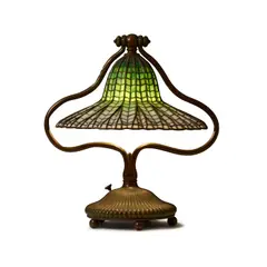 Tiffany Studios, Lotus Bell Table Lamp, leaded glass, patinated bronze, shade tag stamped 'TIFFANY STUDIOS NEW YORK', underside of base stamped 'TIFFANY STUDIOS NEW YORK 4491'