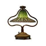 Tiffany Studios, Lotus Bell Table Lamp, leaded glass, patinated bronze, shade tag stamped 'TIFFANY STUDIOS NEW YORK', underside of base stamped 'TIFFANY STUDIOS NEW YORK 4491'