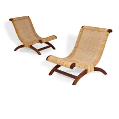 Clara Porset, Pair of Butaque Chairs, made by Luteca, walnut, cane, each stamped 'LUTECA' with firm's mark