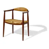 The Chair by Hans J. Wegner, for Johannes Hansen, teak, cane, with branded Johannes Hansen mark on underside, offered Mar 2024