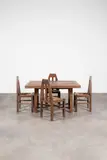 Marcel-Louis Baugniet, Quatre chaises de salle à manger avec assises en rotin et une table en chêne, conçues en 1927, Four dining chairs with cane wickered seats and a dining table, oak, designed 1927