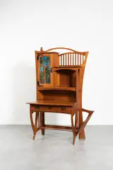 Bureau - Bonheur du jour by Gustave Serrurier-Bovy, 1898, Oak wood, blackened iron hinges and handles, opening with a glass door in the upper part, a drawer under the top, sold Dec 2023