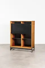 Secrétaire, modèle 100 by Jules Wabbes, Solid padauk, black formica laminated fall-front on gun-barrel steel base, sold Dec 2023