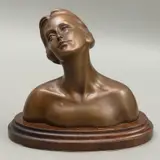 MÉXICO, SIGLO XX by Busto Femenino, Bronce, patinado en color marrón; con base de madera, offered Aug 2024