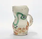 Visage aux cercles (Face with Circles) by Pablo Picasso, 1969, White earthenware turned pitcher painted in gray patina, green, red, blue, and white,, sold Oct 2013