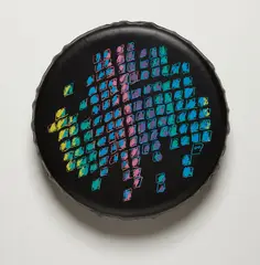 Valentin Carron, Colors, 2004, Screenprint in colors, on tire cover comprised of acrylic-fiber backed vinyl, ink, elastic, and nylon thread over rubber tire,
