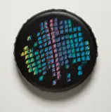 Valentin Carron, Colors, 2004, Screenprint in colors, on tire cover comprised of acrylic-fiber backed vinyl, ink, elastic, and nylon thread over rubber tire,