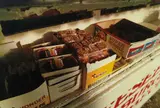 Morton, Mississippi (Snacks on Shelf) by William Eggleston, 1971, Dye transfer print from 14 Pictures , printed 1974, sold Oct 2013