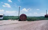 Black Bayou Plantation near Glendora, Mississippi (Red Barrel) by William Eggleston, 1974, Dye transfer print, sold Oct 2013