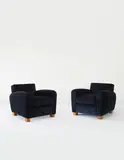 Jean Royere, Pair of armchairs, circa 1957, Mohair velvet, oak