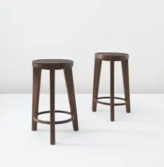 Two stools from Punjab University, Chandigarh, India, model no. PJ-SI-22-A by Pierre Jeanneret, circa 1965, Teak, iron, sold Jun 2013
