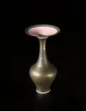 Vase with flaring lip by Lucie Rie, circa 1978, Porcelain, bright golden glaze with radiating inlaid pink design to the lip, sold Jun 2013