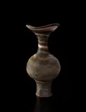 Tall vase with flaring lip by Lucie Rie, circa 1980, Mixed stoneware body producing an integral brown and pink spiral, sold Jun 2013
