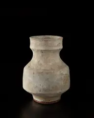Squat oval vase by Lucie Rie, circa 1980, Stoneware, gray glaze with a manganese speckle, sold Jun 2013